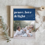 Peace Love and Light Navy Blue Hanukkah Photo Holiday Card<br><div class="desc">Peace,  love,  and light. | Send your Hanukkah greetings to family and friends with this customizable Hanukkah card. It features retro bold typography. Personalize this photo Hanukkah card by adding your details. This custom Hanukkah card is available in other colors and cardstock. Matching items are also available.</div>