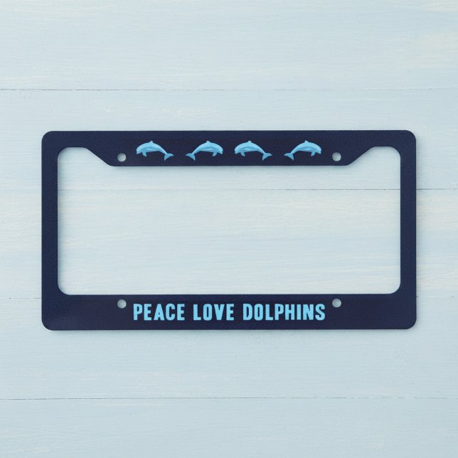 Peace Love Dolphins License Plate Frame (Peace love dolphins license plate frame.)