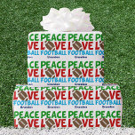 Peace Love Football Custom Christmas Wrapping Paper<br><div class="desc">Peace Love Football. Cute personalized blue Christmas wrapping paper for a football player or coach. This cool sports pattern is green,  red,  and blue with the ball in the center.</div>