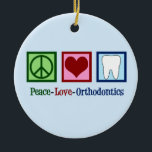 Peace Love Orthodontics Christmas Ceramic Ornament<br><div class="desc">A cute Orthodontist Christmas ornament gift featuring a peace sign,  heart,  and a tooth. Peace Love Orthodontics present for someone who fixes teeth with braces.</div>