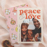 Peace & Love Retro Groovy Arch Fun Christmas Photo Holiday Card<br><div class="desc">A fun and colorful Christmas Holiday Photo Card design! This "Peace & Love Retro Groovy Arch Fun Christmas Photo Card" design features "Peace & Love" in a retro, groovy font. The ampersand in casual handwriting adds a laid-back feel. Below, to the right, the arch-shaped frame showcases a custom photo to...</div>