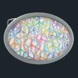 Peace Symbols Art Oval Belt Buckle<br><div class="desc">PEACE SIGN ART - These peace signs are in a multitude of colors. The art is from original watercolors paintings. No words are needed when the peace symbol is present - an international symbol of love, not war; of peace on earth; of peace in our hearts; of world peace. Celebrate...</div>