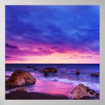 Peaceful Beach Sunset with Rocks and cloudy sky