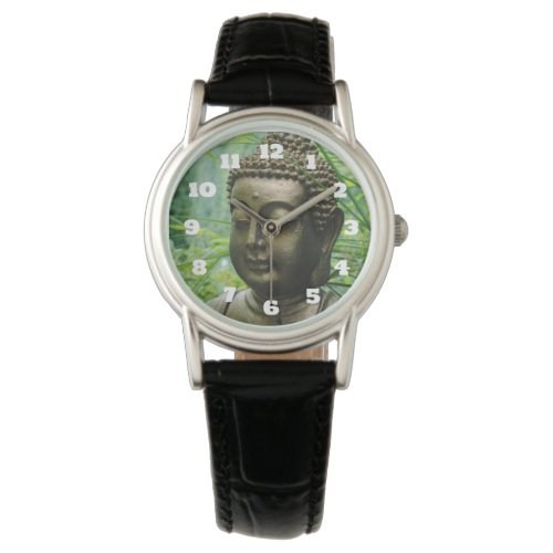 Peaceful Buddha Statue in a Leafy Green Forest Watch