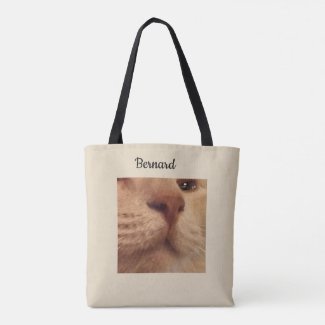 Peach Cat Beranard on a tan tote bag