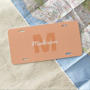 Peach color of 2024 with custom Monogram name License Plate