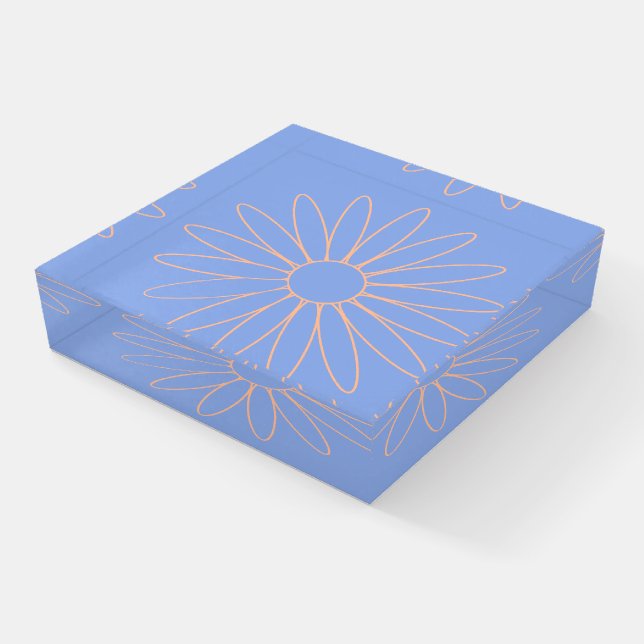 Peach Daisy Flower on Rock Blue Glass Paperweight (Angled)