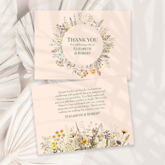 Peach Fuzz Wildflower Meadow Wedding Thank You Card (Peach Fuzz Wildflower Meadow Wedding Thank You Card on a sunny white table with dry palm leaf.)
