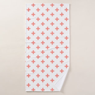 Peach polka crosses on white bath towel
