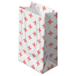 Peach polka crosses on white small gift bag