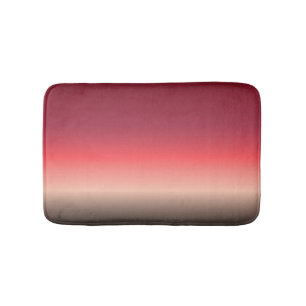 Peach to black bath mat
