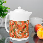 Peachy Blooms Watercolor Peach Themed  Teapot<br><div class="desc">Introducing the "Peachy Blooms" watercolor peach themed home décor collection, designed to bring elegance and charm to your living space. This collection includes a laminated placemat, a serving tray, a teapot, and a porcelain pitcher, each adorned with delightful watercolor peach designs. Brew and serve your favorite teas with the peach-themed...</div>