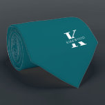 Peacock Blue | Elegant Monogram Name | One-Sided Neck Tie<br><div class="desc">An elegant one-sided necktie featuring a bold white monogram across a Peacock Blue background. On top of this monogram sits your first or last name spelled out in all capitals. If you prefer a bolder look for the personal name inside of the large letter you can do the following: Use...</div>