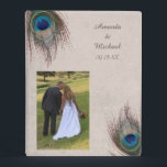 Peacock Feather Border Wedding Mini Binder<br><div class="desc">Pretty blue, tan, and green peacock feathers swirl around the top left and bottom right corners of this wedding memory binder. Your custom text is in brown in two text fields at the upper right. The images and text are placed on a distressed light gray tan background which complements the...</div>