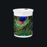 Peacock Feathers Drink Pitcher<br><div class="desc">peacock, feather, bird, green, beautiful, isolated, blue, design, beauty, nature, vector, colorful, color, plume, bright, art, closeup, tail, background, decoration, illustration, macro, element, pretty, decor, animal, plumage, wildlife, abstract, exotic, eye, detail, texture, pattern, elegance, white, object, turquoise, elegant, tropical, fluffy, wild, drawing, peafowl, silhouette, copy, shiny, creative, decorative, close-up</div>