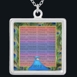 Peacock Wedding Photo Silver Necklace<br><div class="desc">Personalize this pretty necklace to have as wedding favors at your wedding reception or to have one yourself as a remembrance of your special day. This necklace is also the perfect gift for the bride at her bridal shower. Personalize by adding your photo, and changing the text in the fields...</div>