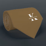 Peanut Brown Elegant Monogram   Name Neck Tie<br><div class="desc">An elegant necktie featuring a bold white monogram across a Peanut Brown background. On top of this monogram sits your first or last name spelled out in all capitals. If you prefer a bolder look for the personal name inside of the large letter you can do the following: Use the...</div>