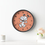 Peanuts | A Snoopy Happy Dance Clock<br><div class="desc">Snoopy is the loveable pet beagle of Charlie Brown in the comic strip Peanuts by Charles M. Schulz. Check out this cute Peanuts design featuring this loveable dog.</div>