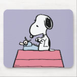 Peanuts | Snoopy at the Typewriter Mouse Pad<br><div class="desc">Check out this awesome Peanuts design featuring Snoopy.</div>