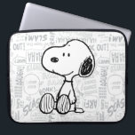 PEANUTS | Snoopy on Black White Comics 2 Laptop Sleeve<br><div class="desc">This Peanuts artwork features Snoopy sitting on background of black and white Charles M. Schulz comic strips.</div>