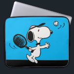 Peanuts | Snoopy Plays Tennis Laptop Sleeve<br><div class="desc">In the Peanuts comic strip and animated films,  Snoopy is often depicted playing tennis against his owner Charlie Brown or other characters like Linus and Lucy. This design showcases Snoopy's athletic abilities and competitive spirit in a humorous way.</div>