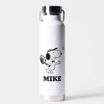 Peanuts | Snoopy Plays Tennis Water Bottle<br><div class="desc">In the Peanuts comic strip and animated films,  Snoopy is often depicted playing tennis against his owner Charlie Brown or other characters like Linus and Lucy. This design showcases Snoopy's athletic abilities and competitive spirit in a humorous way.</div>