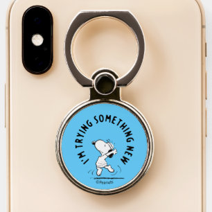 Peanuts   Snoopy Trying Something New Phone Ring Stand