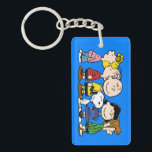 Peanuts | The Peanuts Gang Together Keychain<br><div class="desc">This design features Charles M. Schulz's popular comic strip gang from the loveable Peanuts series.</div>