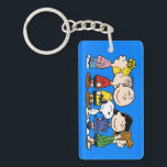 Peanuts | The Peanuts Gang Together Keychain<br><div class="desc">This design features Charles M. Schulz's popular comic strip gang from the loveable Peanuts series.</div>