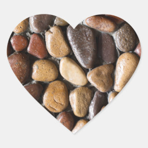 Pebbles background heart sticker