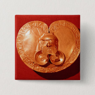 Pectoral with a human face pinback button