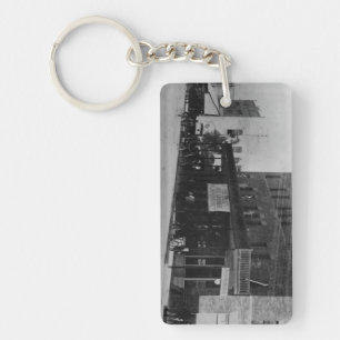 Pedestrians, cyclists, and horse-carriages keychain