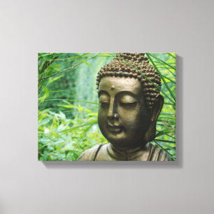 Peeaceful Buddha Statue in a Leafy Green Forest Canvas Print