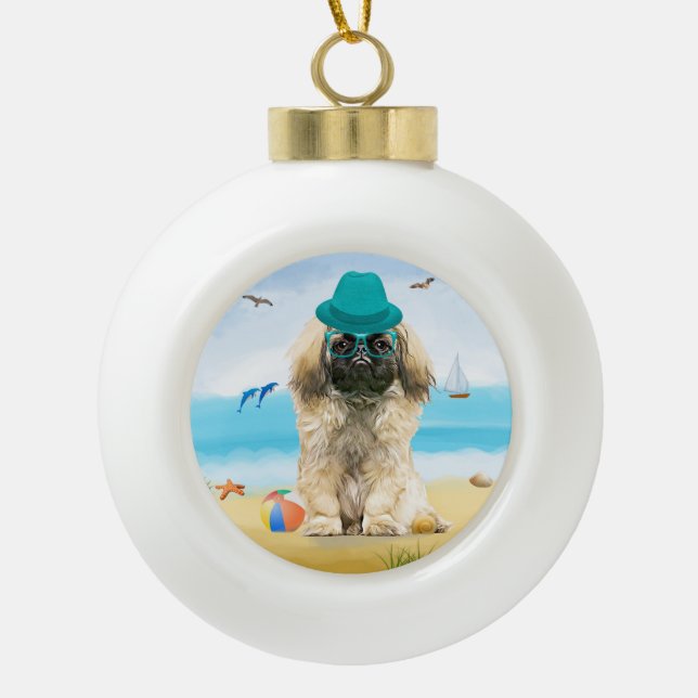Pekingese Dog on Beach  Ceramic Ball Christmas Ornament (Front)