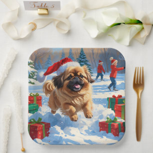 Pekingese Dog Running in Snow with Christmas Hat Paper Plates