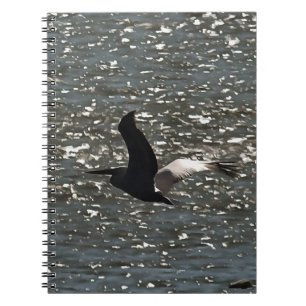 Pelican Flying Over Shimmering Lake Bafa Notebook
