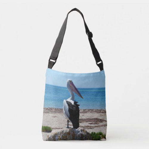 Pelican On Beach Rock Crossbody Bag