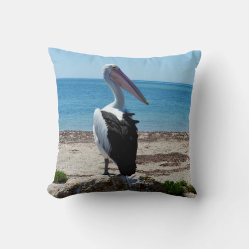 Pelican On Beach Rock Throw Pillow
