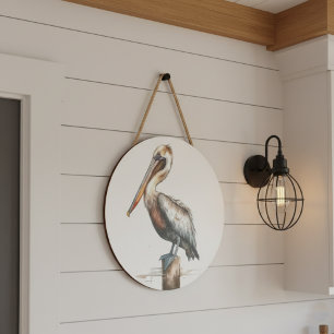 pelican standing on a pole watercolor sign
