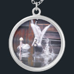 Pelican Takeoff Silver Plated Necklace<br><div class="desc">In the original photograph by MaeFlowers on this Necklace, two pelicans were gliding on the water near a boat, when suddenly one pelican took off. The rippled water reflects the scene, including the splash as the wild bird heads upward - a visual to inspire us to pursue our dreams. Wear...</div>