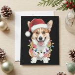 Pembroke Welsh Corgi Santa Christmas Tree Lights Holiday Card<br><div class="desc">Pembroke Welsh Corgi Santa Christmas Tree Lights features a cheerful corgi wearing a Santa hat and wrapped in colorful holiday lights. The design has a cute, festive look that blends dog lover charm with classic Christmas details. It is a fun seasonal choice for corgi fans, pet lovers, and anyone who...</div>