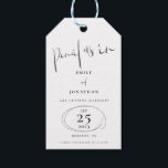 Pencil Us In Stylish Black Script White Gift Tags<br><div class="desc">A modern typographical design with stylish handwriting style set script Pencil Us In at the top. The word "and" in between your names is in a matching set script. Artsy hand drawn scribble type lines wrap around your date. The rest of the text can be easily personalised, which is in...</div>