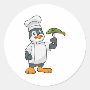 Penguin as Cook with Fish & Cooking apron Classic Round Sticker
