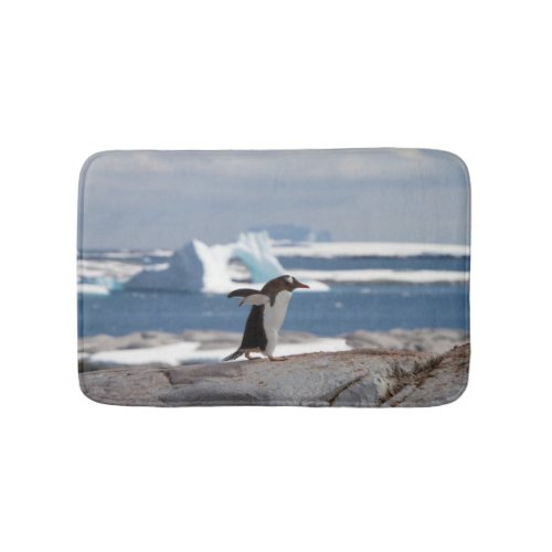 Penguin in front of an ice arch bath mat