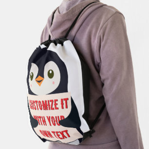 Penguin mascot holding a sign for custom text drawstring bag