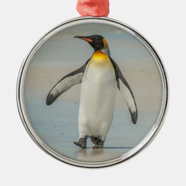 Penguin walking on the beach metal ornament (Front)