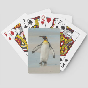 Penguin walking on the beach poker cards