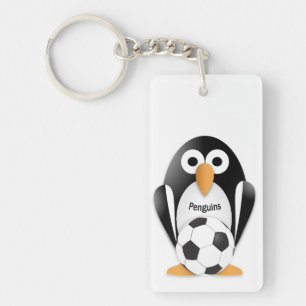 Penguin with a soccer ball keychain
