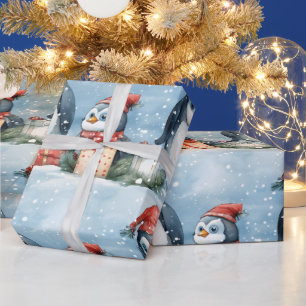 Penguins gift-wrapping in the snow wrapping paper