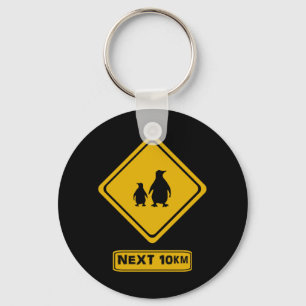 penguins road sign keychain